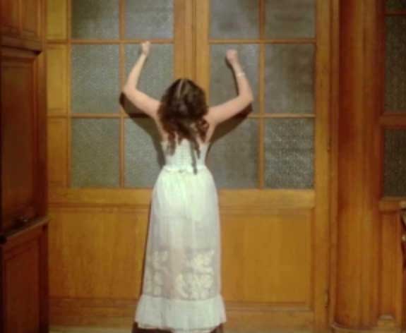 girl pounding door